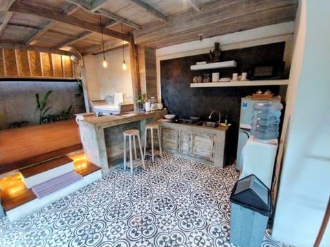 bar table between kitchen and living