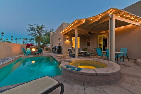 This stunning villa sits on a double lot with a patio, pool and citrus grove!