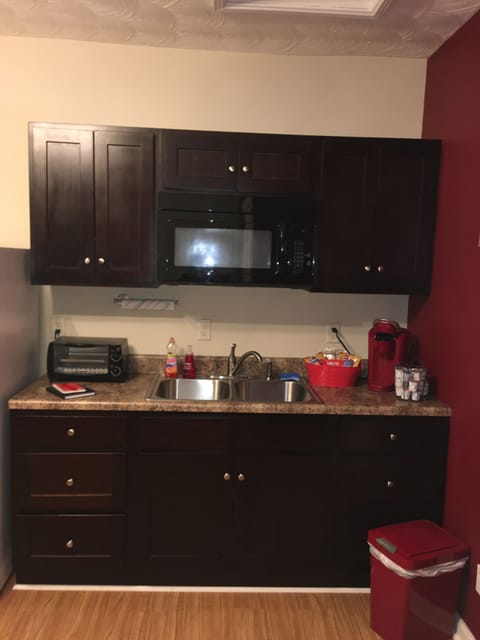 Kitchen has full fridge,microwave, hot plate, toaster oven & small crockpot.