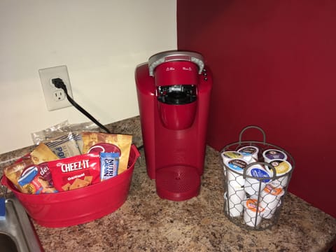 Keurig coffee pot with coffee pods provided. 
