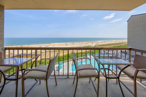 Enjoy your morning coffee or evening drink on the covered balcony!