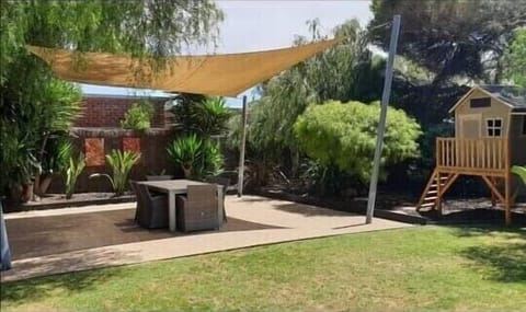 Shaded outdoor entertainment area.