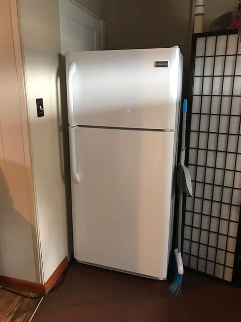 Full size refrigerator with cold bottled water