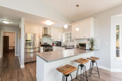 kitchen and hallway to 4th bedroom