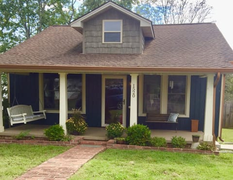 Wide front porch with covered seating