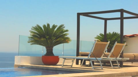 rooftop with an amazing view to the beach, ocean, pear, the whole Banderas Bay