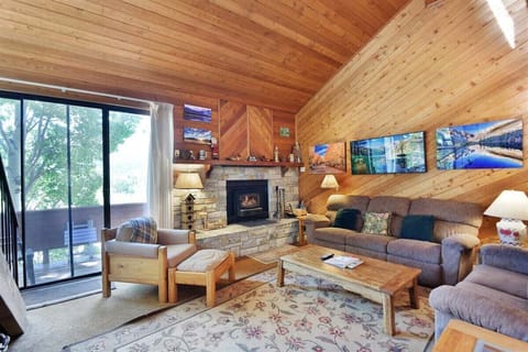 Living Room has a Fireplace and Outside Deck