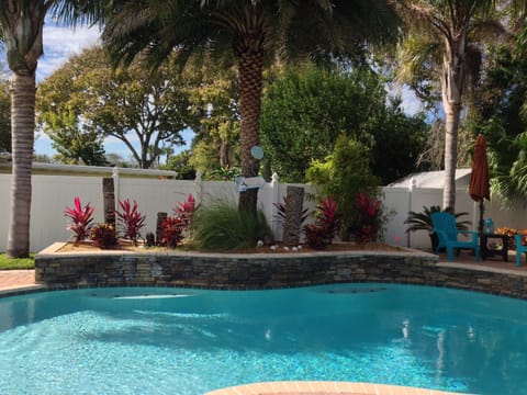 Enjoy full pool view from Great Room.EZ access dbl doors full view glass.