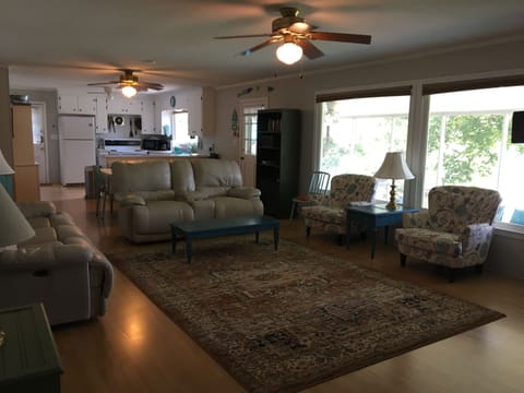 Spacious den is open to kitchen