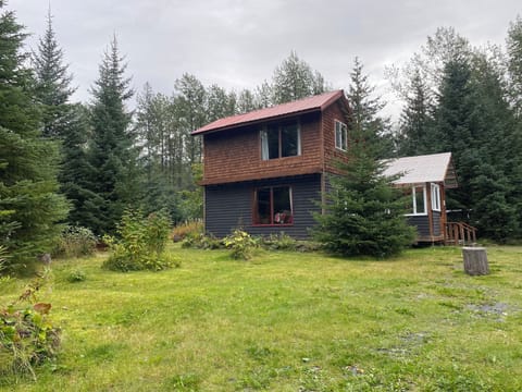 Cabin on forested acre in a quiet neighborhood near town. 
