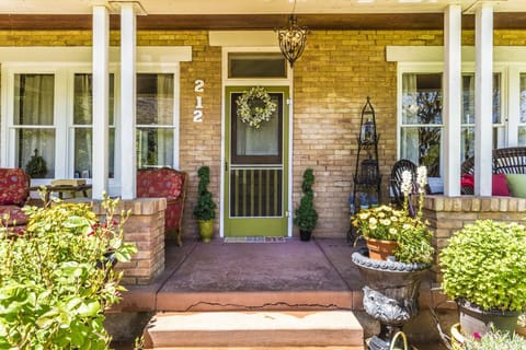 Front door has PIN code as well but it's better to enter through the back. 