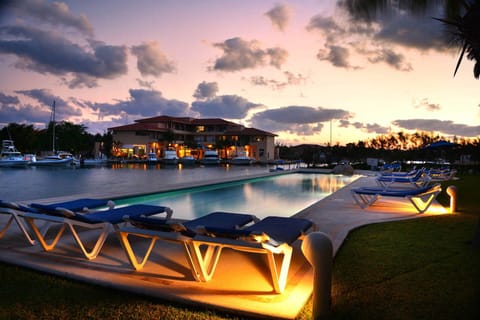 sunset by the pool