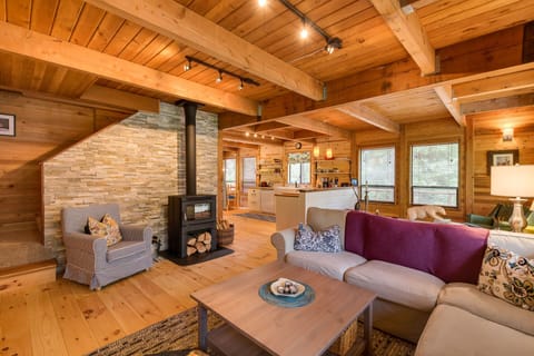 Living room with kitchen in background