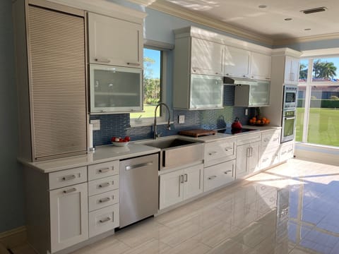 Large chefs kitchen Bosch appliances and all small appliances & large windows