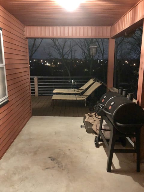 View of the lake and the city lights at night.