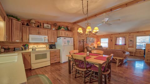 Upstairs living room and kitchen for open floor plan. Decks on either side. 