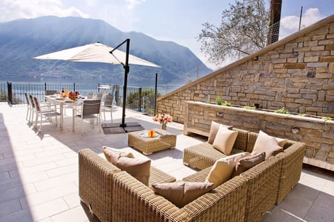 Dining or relaxing, enjoy an enviable lake view from your private terrace.