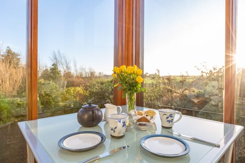 South facing conservatory. Ideal for bird watching or eating your breakfast.