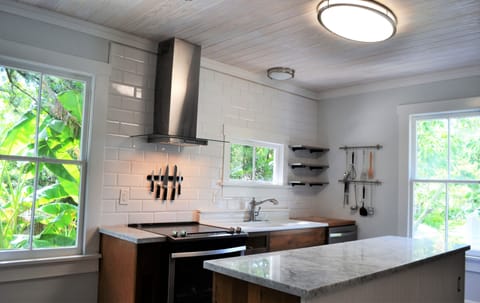 Kitchen with Subway Wall and Soap Stone Counters