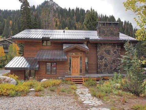Red Fern Chalet from the private parking spot. Westward Ho! in the background.