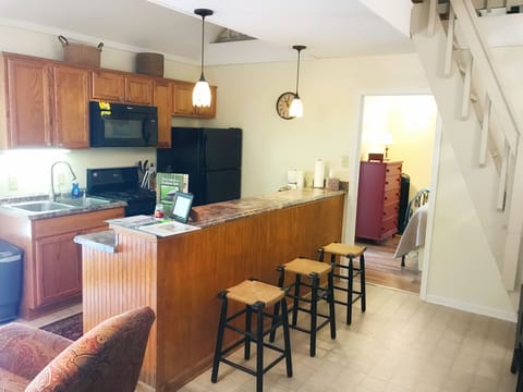 Jack's has a full kitchen with a stove, oven, refrigerator, microwave & toaster