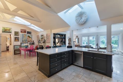 Open living space:  dining area and kitchen.