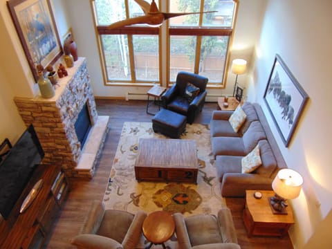 Great room view from loft. Ample seating including an American Leather couch.