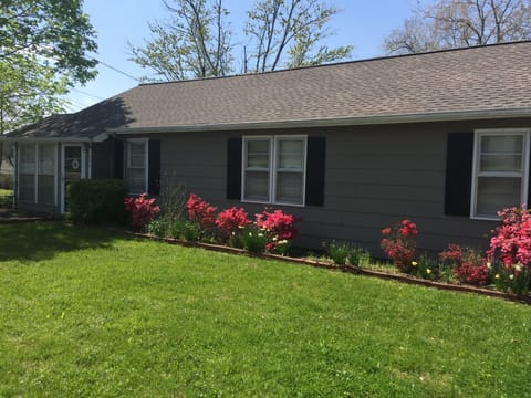 Front of the home in spring bloom. 