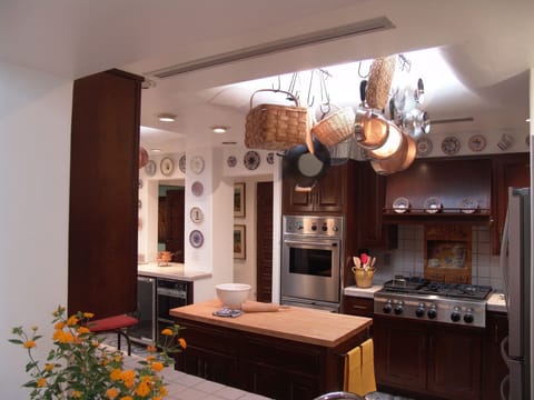 Gourmet country kitchen including wine cooler, warming oven, ice maker