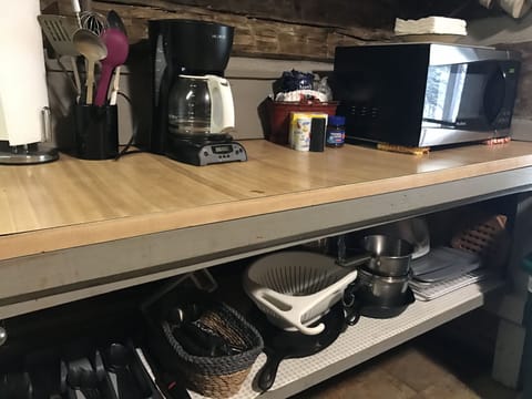 Annie's kitchen comes fully stocked with pots, pans, utensils, and table ware.