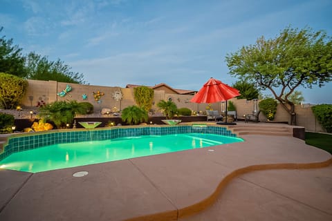 Heated pool and spa with water features.