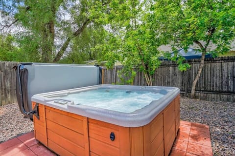Slip into the bubbling hot tub after a day out and unwind in the fresh air under the trees.