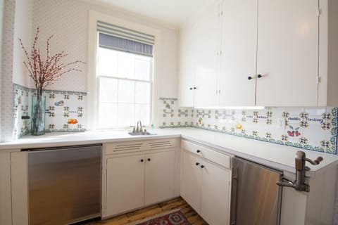 Classic Leland kitchen w bright light w island for picnic prep&wine tasting