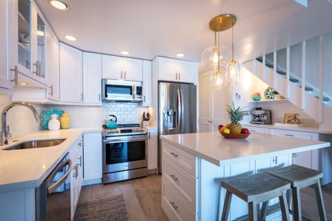 New kitchen with all new appliances, counters, cabinets & lighting