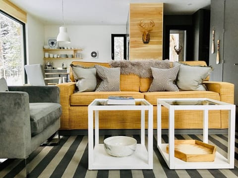 Cozy living room designed for relaxing stays.