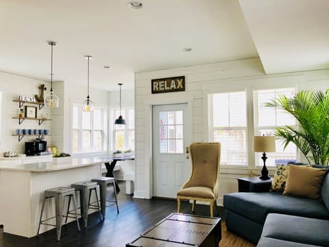 Hanging in the living room, kitchen and dining nook is perfect for conversation.
