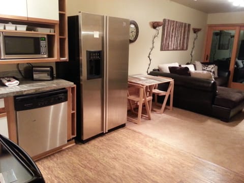 Kitchen has dropleaf table that can seat 2 or 4 if pulled out