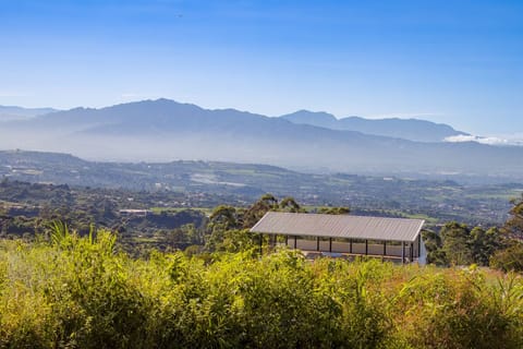 View of our condo building with beautiful mountains in the background.