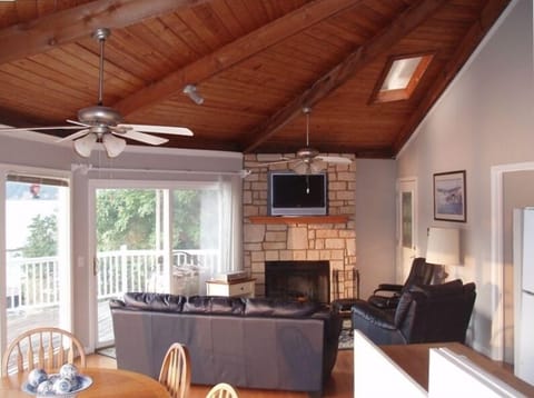 Unique 6-sided room. Great Room w/ stone wood burning fireplace & TV