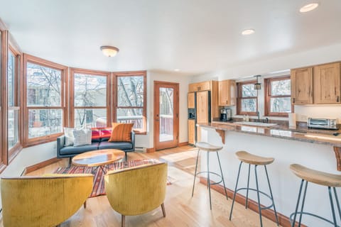 Spacious and chic living area  with NEW powder room and two decks