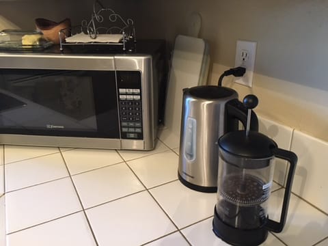 French press and coffee beans provided