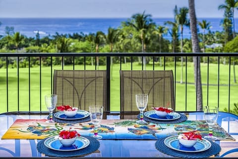 Outdoor Dining Area with Table Settings on the Lanai