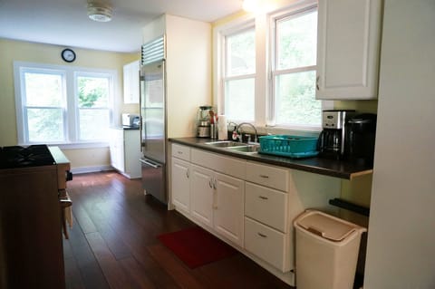 Kitchen equipped with high end appliances sub zero fridge and viking stove