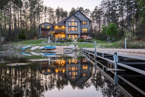 From the Dock: Easy on the eye from the dock soaking up dusk, the beach, complimentary boats and the incredible Lodge.  A lot of fish have been caught off this dock!