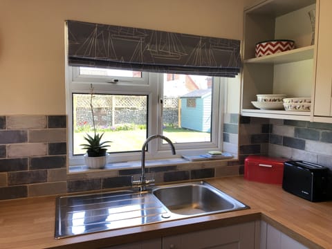 Kitchen - looking through the window into the back garden
