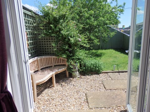 Private, enclosed garden with patio