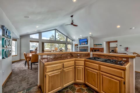 The 4 burner gas range is in the island so the chef of the group and be cooking and enjoying the conversation at the same time