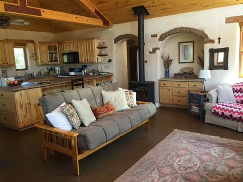 Great room, kitchen, dining, cathedral ceiling - ample yet efficient space.