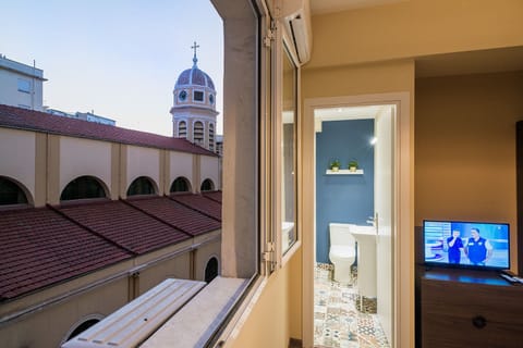 VIEW OF CATHOLIC CHURCH FROM THE 2nd BEDROOM'S WINDOW