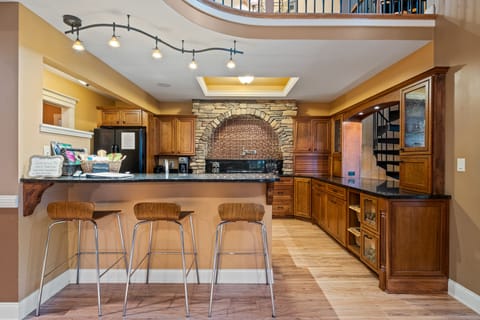 Kitchen with bar height counter.